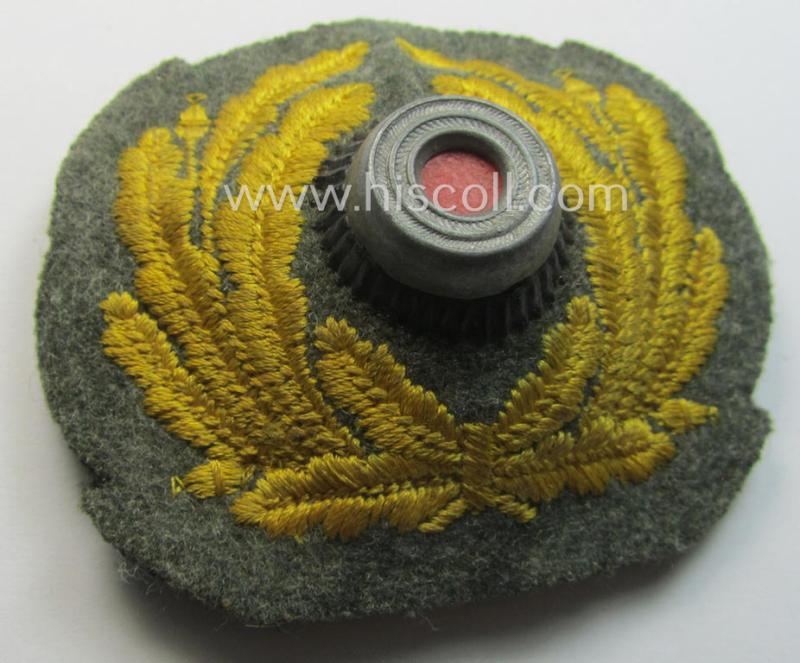 WH (Kriegsmarine o. 'Küsten- o. Marine-Artillerie') EM- (ie. NCO-) pattern, (partly) machine-embroidered cap-cocarde (ie: 'Kokarde für Schirmmütze')