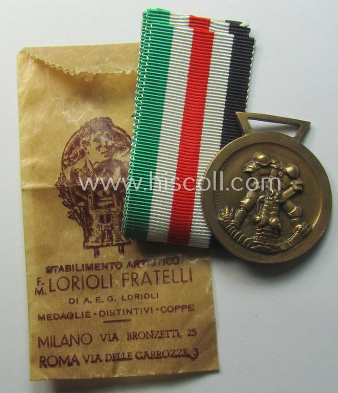 Stonemint medal-set: 'Deutsch-Italienische Feldzugsmedaille' (or: German-Italian campaign-medal) being a maker- (ie. 'Lorioli - Milano'-) marked specimen that comes stored in its period pouch as issued