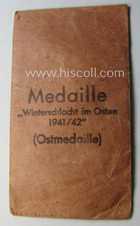 Empty 'Zellstoff'-based pouch as was intended for a medal: 'Winterschlacht im Osten 1941/42' as was produced by the: 'C.F. Zimmermann'-company (ie. 'Hersteller 20')