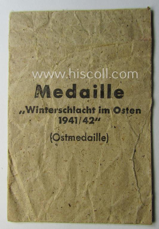 Empty 'variant'-pattern, 'Zellstoff'-based pouch as was intended for a medal: 'Winterschlacht im Osten 1941/42' as was produced by the company: 'A.G. für Heeresbedarf in der Graveur- und Ziseleur-Innung - Berlin' (ie. 'Hersteller 23')