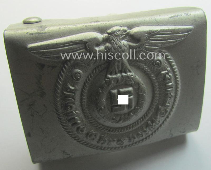 Hardly used- nor worn, example of a Waffen-SS enlisted-mens'- (ie. NCO-) type belt-buckle (being a typical, unmarked and typical steel-based: 'Overhoff & Cie'-example) that comes in a wonderful- and fully untouched-, condition