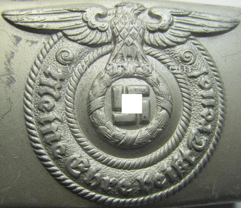 Hardly used- nor worn, example of a Waffen-SS enlisted-mens'- (ie. NCO-) type belt-buckle (being a typical, unmarked and typical steel-based: 'Overhoff & Cie'-example) that comes in a wonderful- and fully untouched-, condition