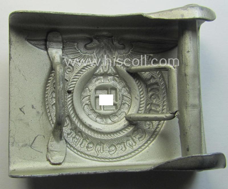 Hardly used- nor worn, example of a Waffen-SS enlisted-mens'- (ie. NCO-) type belt-buckle (being a typical, unmarked and typical steel-based: 'Overhoff & Cie'-example) that comes in a wonderful- and fully untouched-, condition