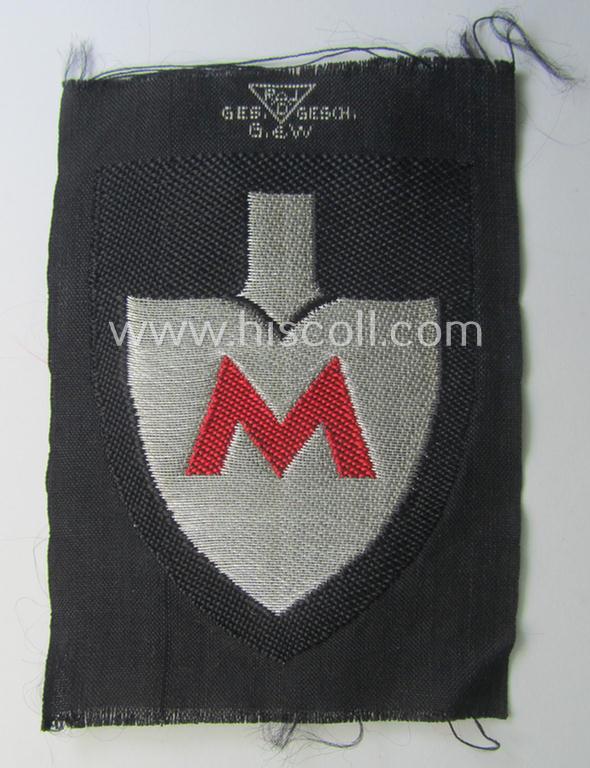 Officers'-pattern, so-called: RAD (ie. 'Reichsarbeitsdienst') sleeve-badge (or: 'Dienststellenabzeichen') bearing the specialist-designation: 'M' (or: 'Hauptmeldebeambter')