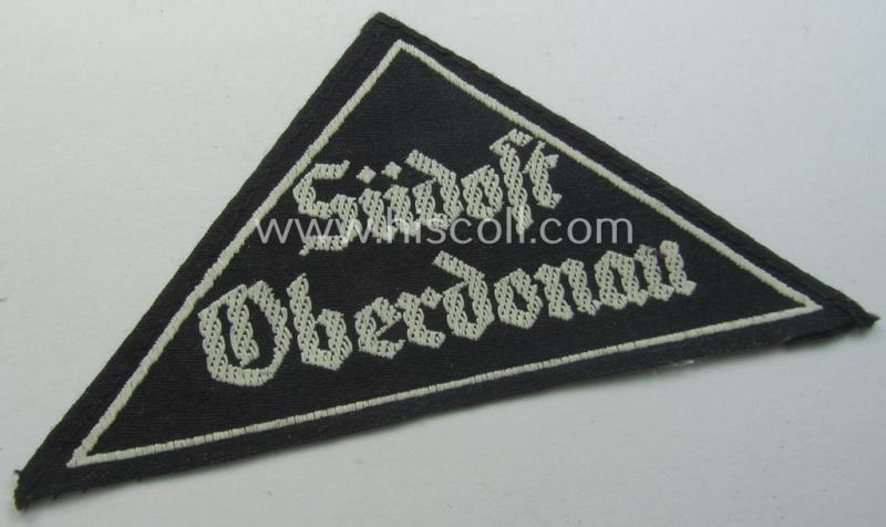 'HJ' ('Hitlerjugend') ie. 'BDM' ('Bund Deutscher Mädel') district-triangle (ie. 'Gebietsdreieck') entitled: 'Südost Oberdonau' (being a 'virtually mint' example that retains its period-attached, paper-based so-called: 'RzM'-etiket)