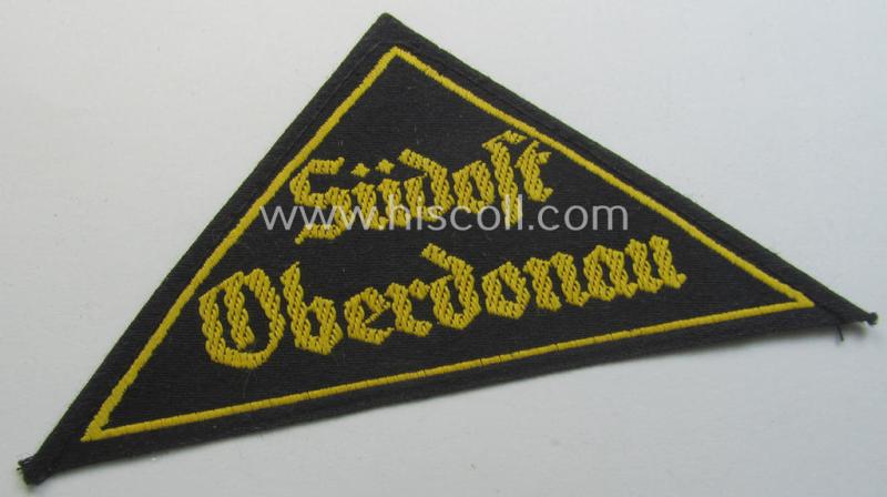 'HJ' ('Hitlerjugend') district-triangle (ie. 'Gebietsdreieck') entitled: 'Südost Oberdonau' (being a 'virtually mint' example that retains its period-attached, paper-based so-called: 'RzM'-etiket)