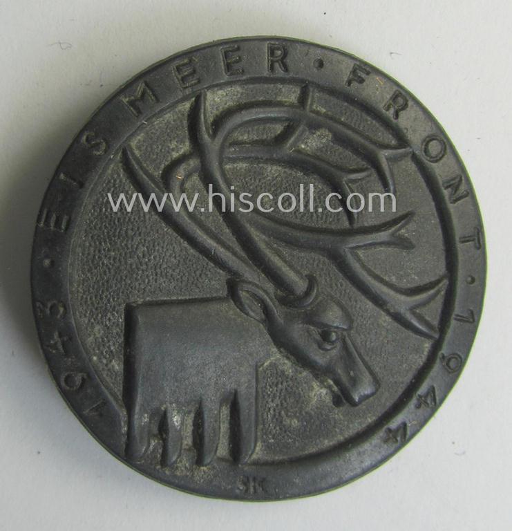 Zinc-based lapel-pin (ie. so-called: 'Traditions- o. Erinnerungsabzeichen') depicting an illustration of an elk surrounded by the text: '1943 Eismeerfront 1944'