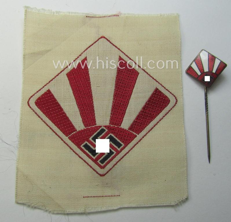 Two-pieced set comprising of an enamelled membership-lapel-pin (ie. 'Mitgliedabzeichen') and sports-attire-patch as being specifically intended for a member who served within the: 'Reichsverband deutscher Turn-, Sport- und Gymnastiklehrer'