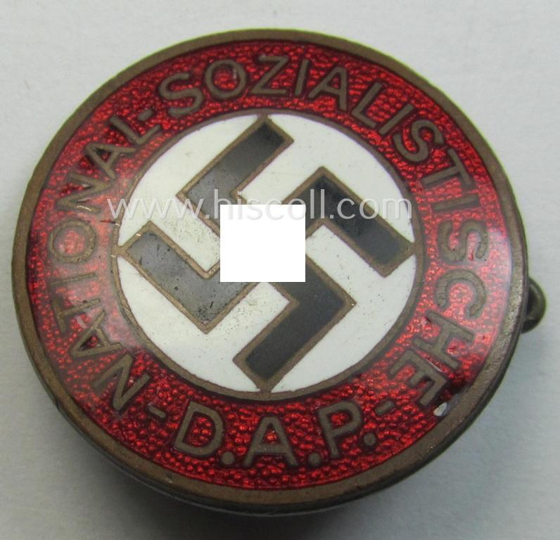 Early-pattern 'N.S.D.A.P. - Parteiabzeichen' showing a: 'Ges.Gesch.'-patent-pending-designation