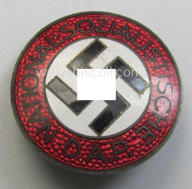'N.S.D.A.P.'-membership-pin- ie. party-badge (or: 'Parteiabzeichen') which is maker-marked on its back with the makers'-designation: 'RzM' and/or: 'M1/34'