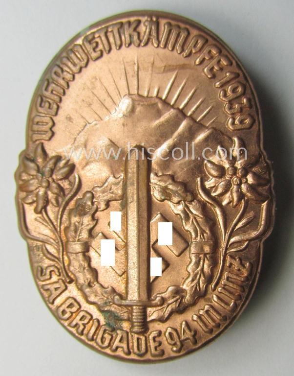 Commemorative, reddish-bronze-toned and Austrian-related, SA- (ie. 'Sturmabteilungen'-) related 'tinnie' being a non-maker-marked example showing an: 'SA-Sportabzeichen', sunburst and text: 'Wettkämpfe 1939 - SA-Brigade 94 in Linz'
