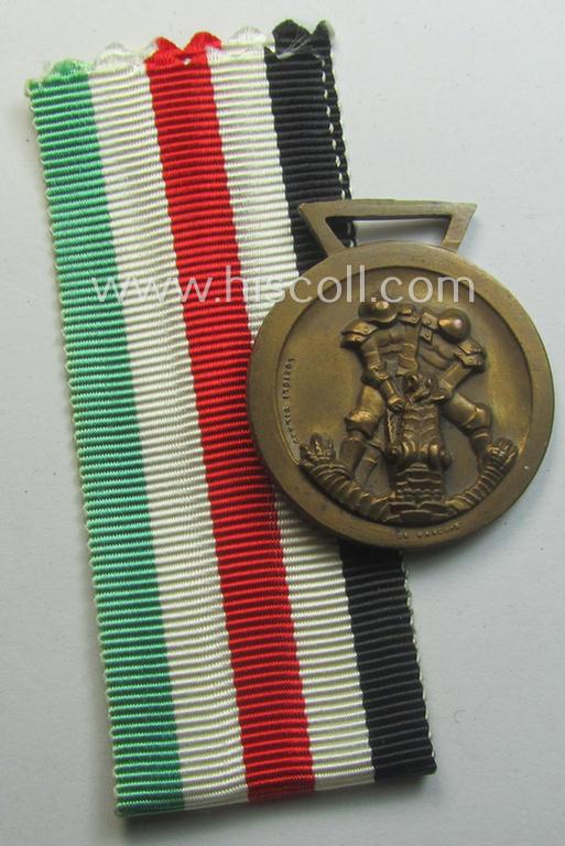 Stonemint medal-set: 'Deutsch-Italienische Feldzugsmedaille' (or: German-Italian campaign-medal) being a maker- (ie. 'Lorioli - Milano'-) marked specimen that comes as issued