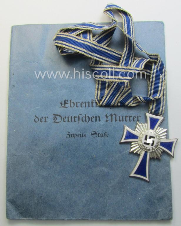 'Ehrenkreuz der deutschen Mutter - zweite Stufe' (or: silver-class mothers'-cross) that came mounted onto its long-sized ribbon and that came stored in its period pouch by the (unusual!) maker: 'Fritz Zimmermann - Stuttgart'