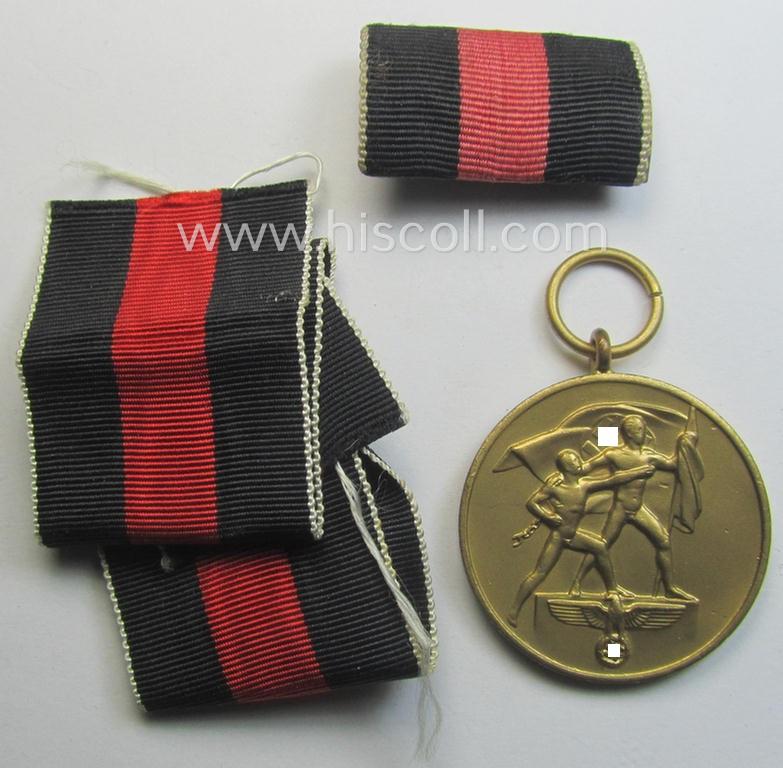 WH Czech-occupation- (ie. 'Anschluss'-) medal: '1. Oktober 1938' being a neat (and virtually mint!) example that came together with its full-length ribbon and single-pieced ribbon-bar as issued and/or recently found