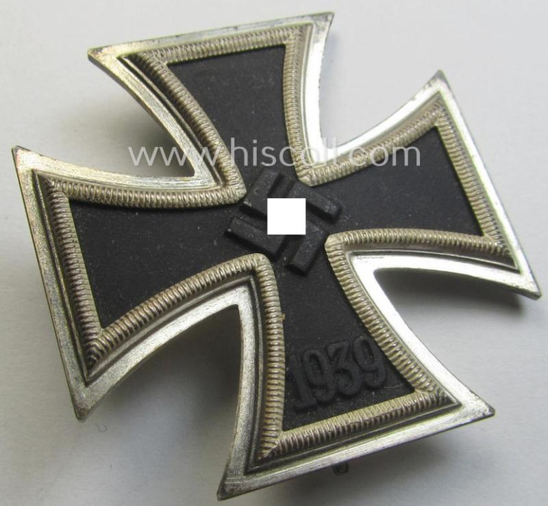 'Eisernes Kreuz 1. Klasse' (or: Iron Cross 1st class) being a typical maker- (ie. '65'-) marked example that was produced by the desirable 'Hersteller' named: 'Klein & Quenzer A.G.'