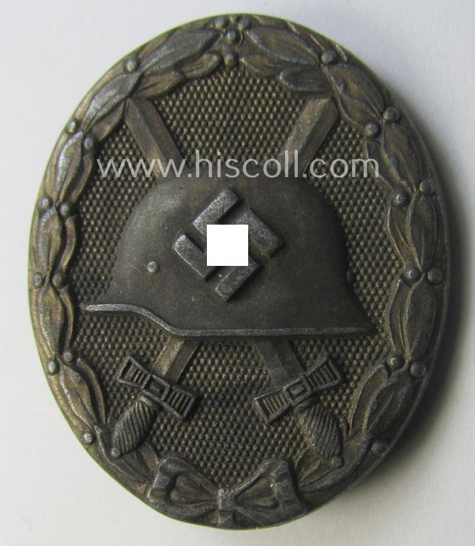 Moderately used- and/or worn - and neatly period-engraved! - 'Verwundeten-Abzeichen in Silber' being a typical maker- (ie. '65'-) marked- and/or: 'Feinzink'-based example by the maker: 'Klein & Quenzer'