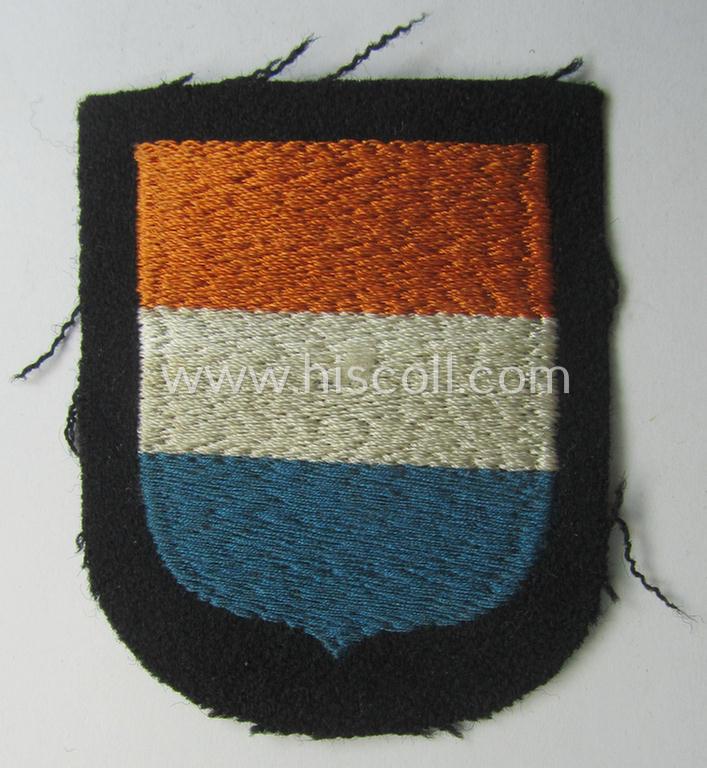 Dutch, Waffen-SS 'volunteer' arm-shield as was specifically intended for usage by soldiers of the: '23. SS Freiwilligen Panzer Grenadier Division' ('Nederland')