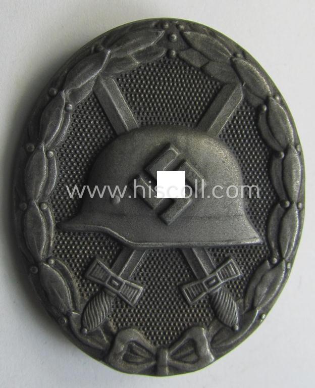 'Verwundeten-Abzeichen in Silber' (ie. silver-class wound-badge) being a maker- (ie. '4'-) marked example as was produced by the: 'Steinhauer u. Lück'-company