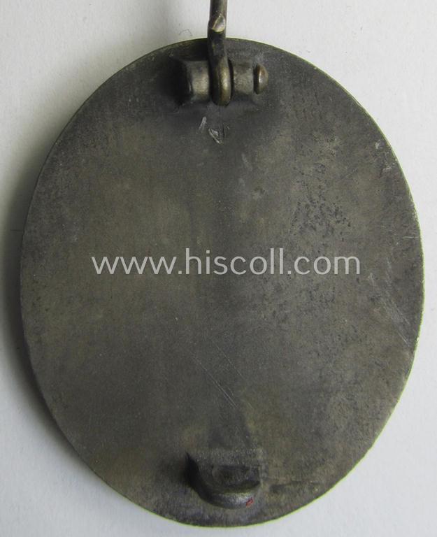 'Verwundeten-Abzeichen in Silber' (ie. silver-class wound-badge) being a maker- (ie. '4'-) marked example as was produced by the: 'Steinhauer u. Lück'-company