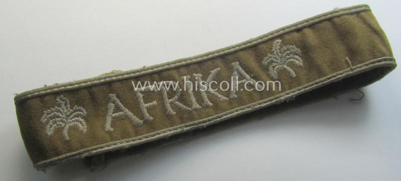 Moderately used WH cuff-title (ie. 'Ärmelstreifen') entitled: 'Afrika' (being a minimally shortened example that comes in an overall very nice- (ie. issued and clearly worn ie. once tunic-attached-), condition