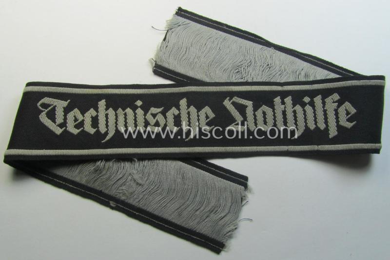 'Technische Nothilfe' (ie. 'TeNo') cuff-title (ie. 'Ärmelstreifen') entitled: 'Technische Nothilfe' being an EM- (ie. NCO-) pattern example as was woven in the neat 'BeVo'-weave pattern