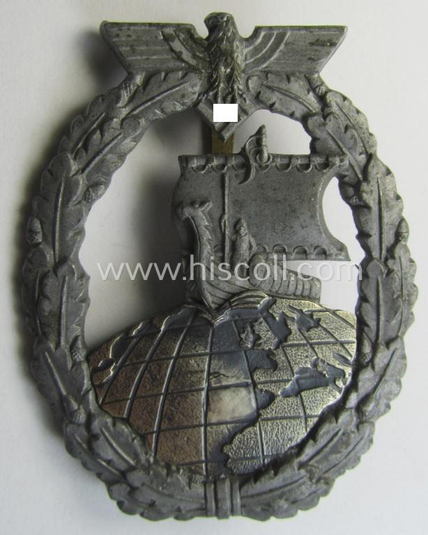 WH (KM) 'Hilfskreuzer-Kriegsabzeichen' (or: auxiliary-cruiser war-badge) being a typical, non-maker-marked- and/or: 'Feinzink'-based example as was produced by the: 'S&L'-company