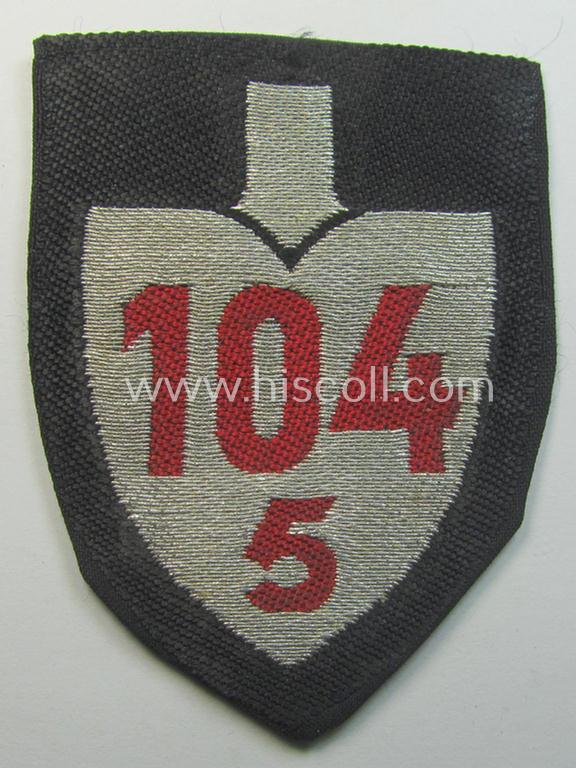 Officers'-pattern so-called: RAD (ie. 'Reichsarbeitsdienst') sleeve-badge (or: 'Dienststellenabzeichen') bearing the specialist- (ie. unit-) designation that reads: '104/5'
