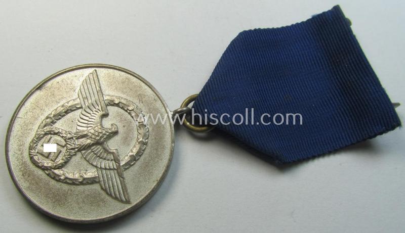 Bright-silver-toned so-called: 'Polizei-Dienstauszeichnung 3. Stufe' (or: police loyal-service medal 3rd class) that comes mounted onto its period ribbon (ie. 'Bandabschnitt')
