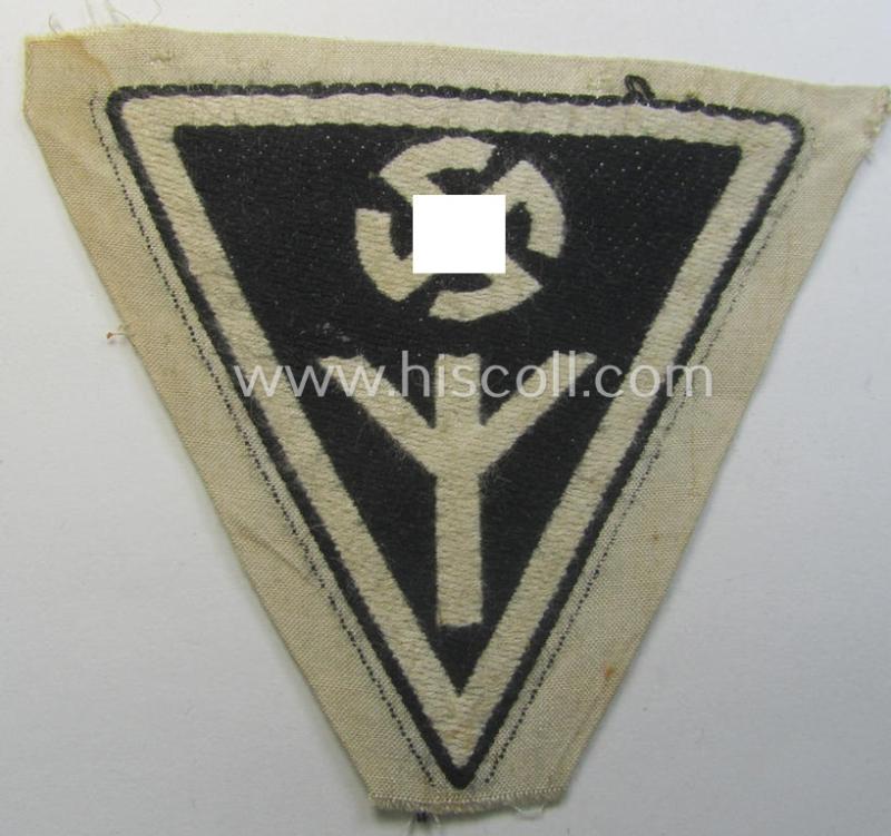Female-related sports-shirt badge as was specifically intended for usage by members serving within the: 'Deutsches Frauenwerk' (or: 'DFW') being a 'virtually mint' (but folded) example that is void of any text