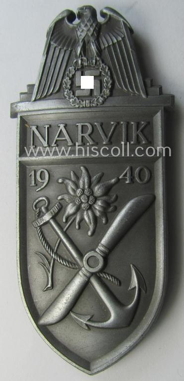 'Virtually mint' - albeit regrettably incomplete - example of a WH (Heeres, LW ie. Waffen-SS) 'Narvik'-campaign-shield as executed in typical: 'Feinzink' (as was presumably produced by the: 'Wilhelm Deumer'-company)