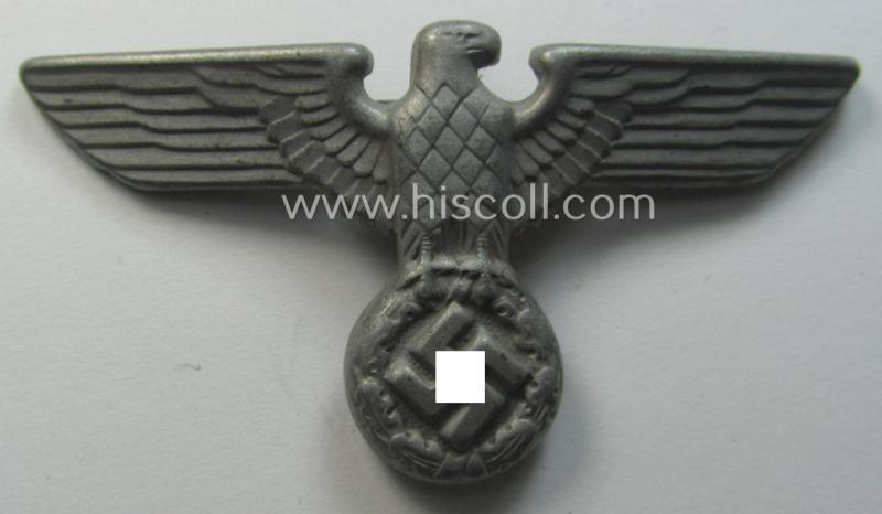 Greyish-silver-coloured- (ie. faded gold) and/or: zinc- (ie. 'Feinzink'-) based (political-style) visor- (ie. 'Schirmmützen'-) cap-eagle being a detailed example that is totally void of a makers'-designation