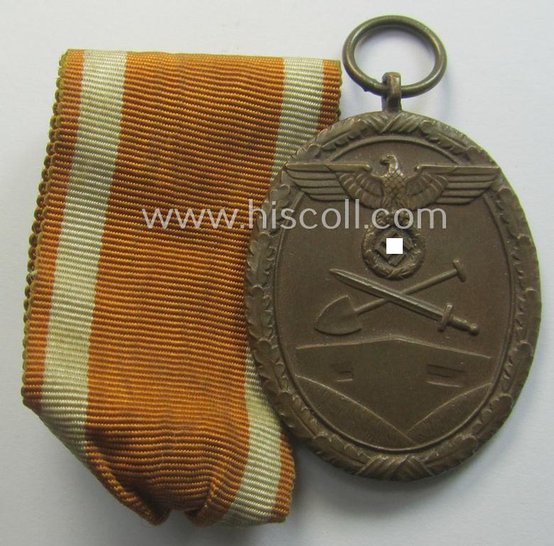 Medal-set: 'Deutsches Schutzwall Ehrenzeichen' (aka: 'Westwall'-medal) being a non-maker-marked- and/or: 'Buntmetall'-based specimen
