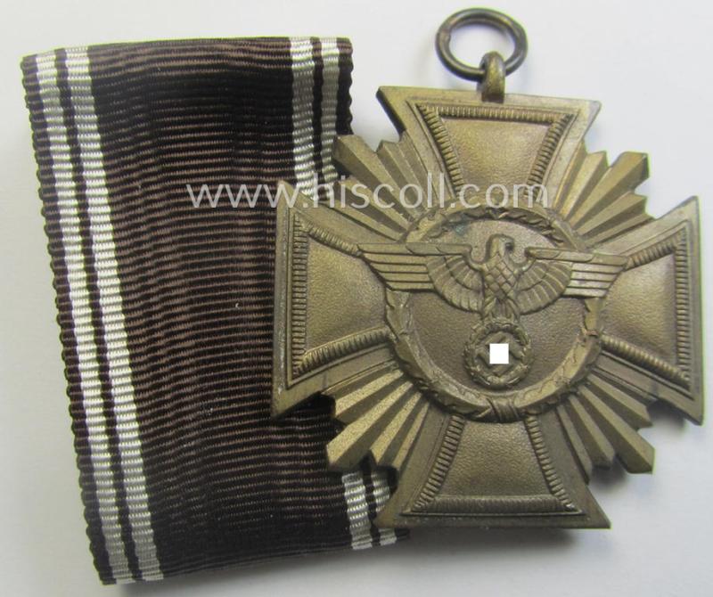 'N.S.D.A.P. Dienstauszeichnung in Bronze' (ie. '3. Stufe für 10 Jahre t. Dienste') being a clearly maker- (ie. '10'-) marked- (and 'light-weight'!) example as was produced by the maker (ie. 'Hersteller') named: 'Förster & Barth'