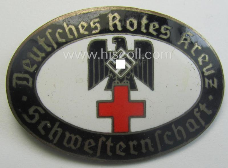 DRK nurses'-badge entitled: 'Schwesternschaft' being a scarcely found, oval-shaped version showing a bearers'-number: ('48'), towns-name: ('Karlsruhe') and/or makers'-mark ('A. Stübbe - Berlin')