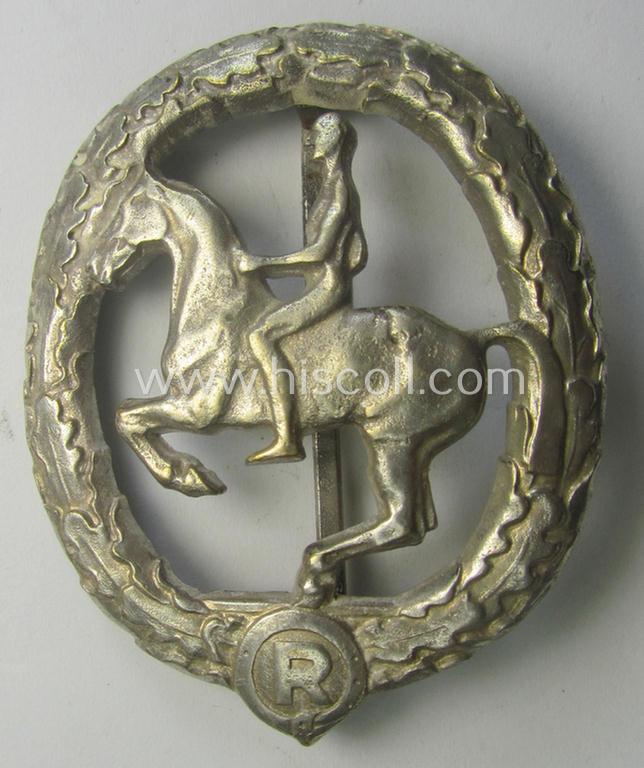 'Deutsches Reiterabzeichen der 2. Klasse (ie. 'in Silber') being a clearly maker- (ie. 'L.Chr. Lauer'-) marked example that comes in an overall nice- (albeit moderately used- ie. worn-), condition