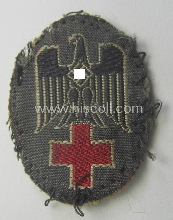 German Red Cross ('DRK' or: 'Deutsches Rotes Kreuz') side-cap eagle (of the desirable first pattern!) to be worn on the specic, greyish-blue-coloured DRK side-caps (ie. 'Schiffchen')