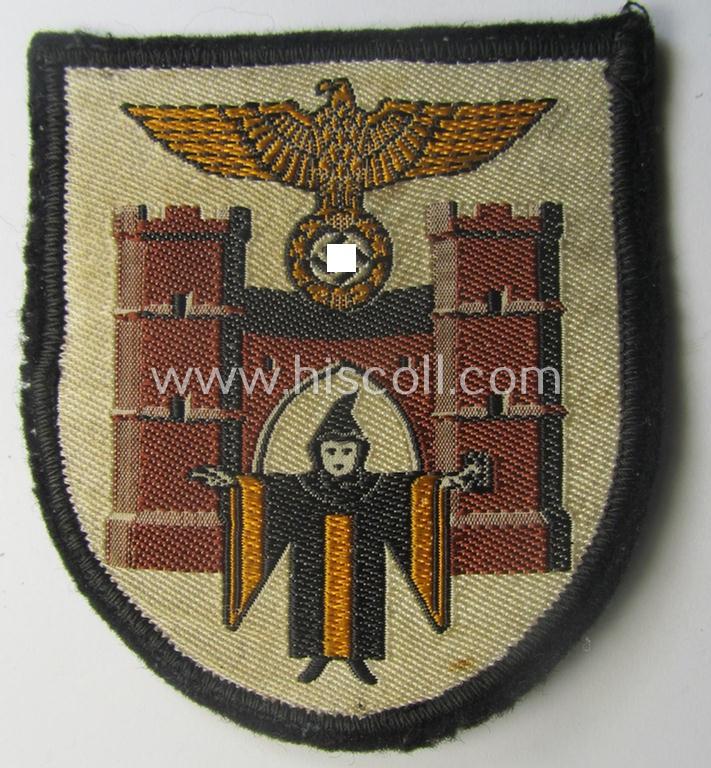 Multi-coloured N.S.D.A.P.-related arm-shield (or: armband-device) showing the coat of arms of the town of München (ie. 'Hauptstadt der Bewegung')