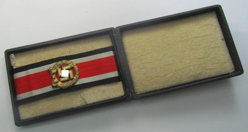 'Ehrenblattspange des Heeres' (or: army honour-roll clasp) being a 'Buntmetall'- (ie. 'Tombak'-) based example by the maker (ie. 'Hersteller') 'Otto Klein & Co.' that comes in its rarely seen black-toned etui