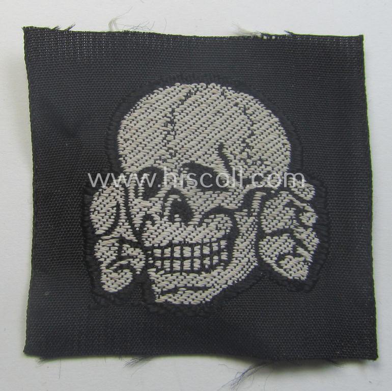 Waffen-SS, 'BeVo'-woven-style skull (ie. 'Totenkopf für Schiffchen o. Einheitsfeldmütze') that comes in a simply never used- (ie. virtually mint- and/or never confectioned-), condition