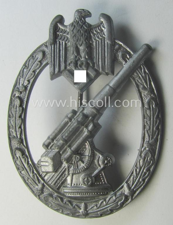 'Heeres-Flakkampf-Abzeichen' being a non-maker-marked- and/or zinc- (ie. 'Feinzink'-) based specimen of the so-called: 'pillow-crimped'-pattern (as was produced by a to date still unidentified maker)