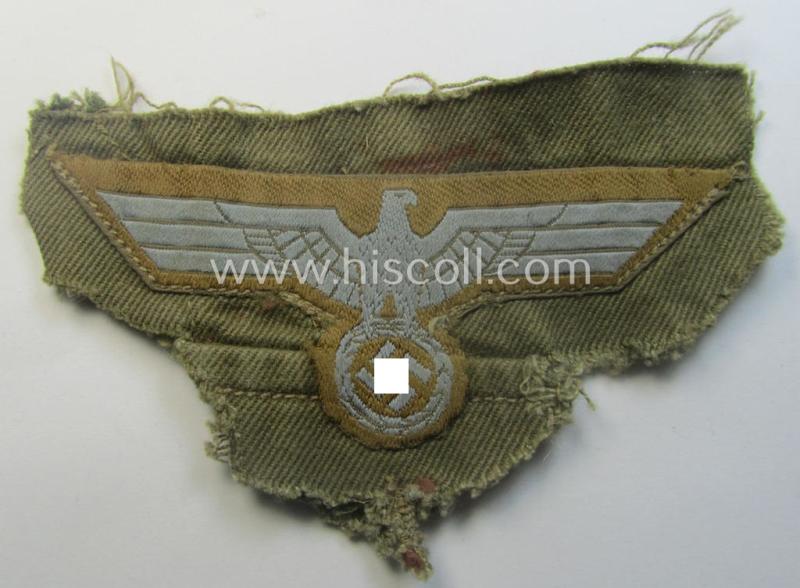 'Cut-out of a tropical-tunic', WH (Heeres) 'tropical-issued', EM- (ie. NCO-) type breasteagle (ie. 'Tropen-Brustadler für Mannschaften und Unteroffiziere des Heeres') that comes in a clearly used- (ie. carefully pre-confectioned-), condition