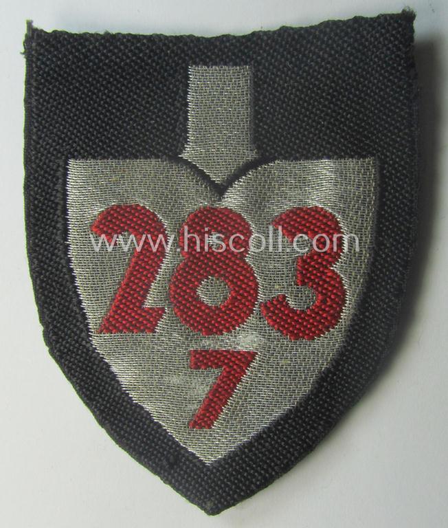 Officers'-pattern so-called: RAD (ie. 'Reichsarbeitsdienst') sleeve-badge (or: 'Dienststellenabzeichen') bearing the specialist- (ie. unit-) designation that reads: '283/7'