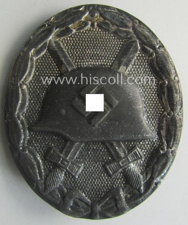 'Verwundeten-Abzeichen in Silber' being a clearly maker- (ie. '26'-) marked- and typical zinc- (ie. 'Feinzink'-) based example as was produced by the desirable maker: 'B.H. Mayer's Kunstprägeanstalt'