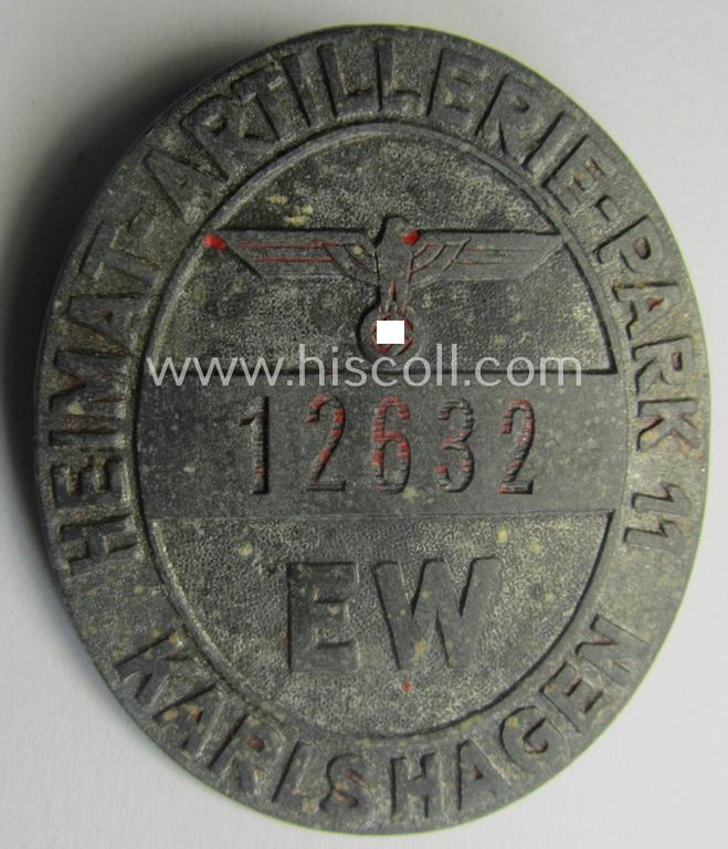 'Dienstabzeichen der Heeresversuchsanstalt' entitled: 'Heimat-Artillerie-Park 11 - Karlshagen' (being connected to the: 'V2 Raketenbasis Peenemünde') that is bearing a serial-numeral that reads: '12632 - EW'