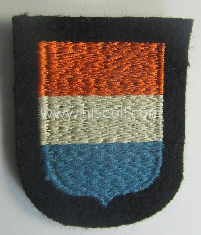 Dutch, Waffen-SS 'volunteer' arm-shield as was specifically intended for usage by soldiers of the: '23. SS Freiwilligen Panzer Grenadier Division' ('Nederland')