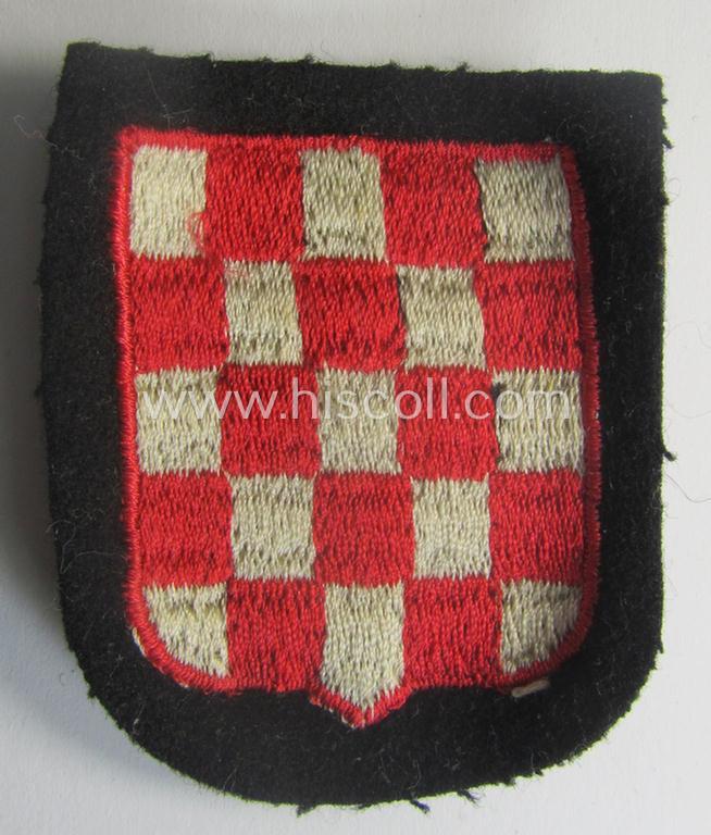 Croatian, Waffen-SS 'volunteer' arm-shield (of a 'variant-pattern'!) as was intended for usage by soldiers of the: '13. Waffen-Gebirgs-Division der SS' (ie. 'Handschar') that comes in a 'virtually mint- ie. unissued', condition