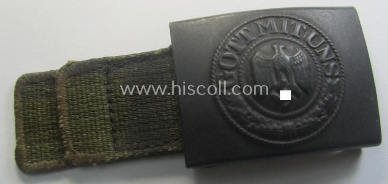 WH (Heeres) 'tropical-issued' belt-buckle being a non-maker-marked (and/or period re-sprayed!) bluish-coloured example that comes mounted onto its original, greenish-coloured- (and/or: 'webbing'-based-) tab