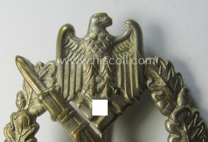 'Infanterie Sturmabzeichen in Silber' (or: silver-class infantry-assault-badge ie. IAB) being a 'Buntmetall'-based example by the: 'Otto Schickle'-company