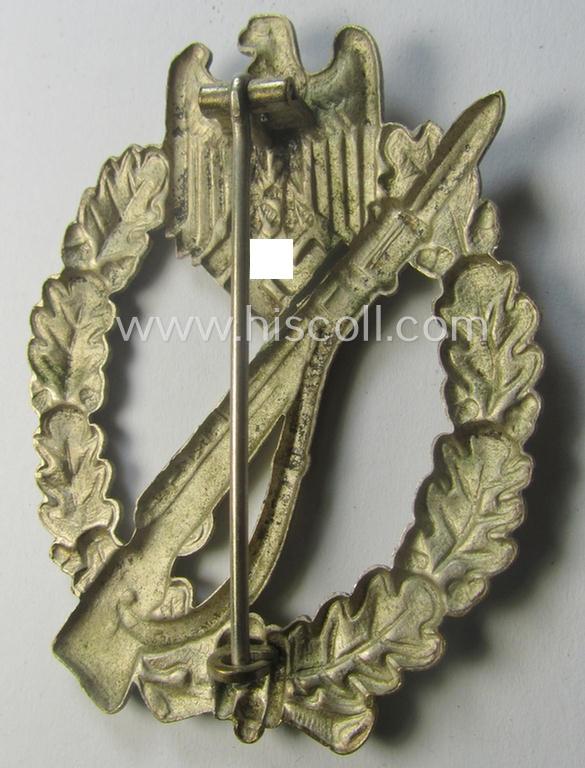 'Infanterie Sturmabzeichen in Silber' (or: silver-class infantry-assault-badge ie. IAB) being a 'Buntmetall'-based example by the: 'Otto Schickle'-company