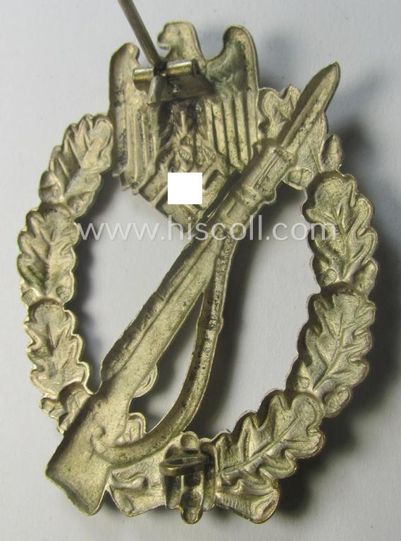 'Infanterie Sturmabzeichen in Silber' (or: silver-class infantry-assault-badge ie. IAB) being a 'Buntmetall'-based example by the: 'Otto Schickle'-company